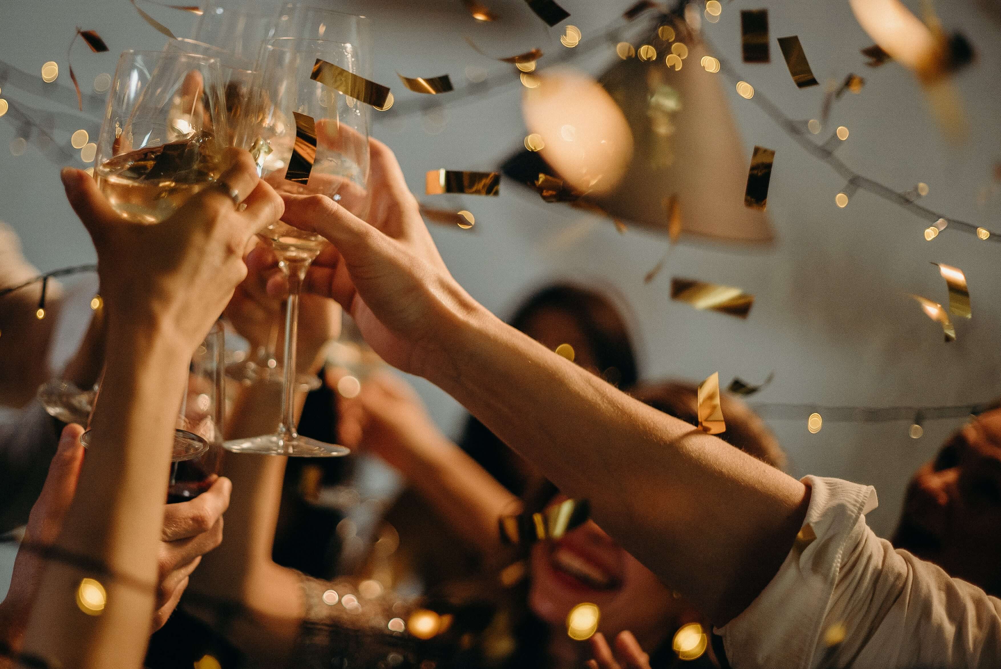 Champagne toast with confetti for a special occasion celebration